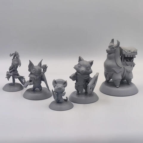 Close-up of a high-resolution grey resin 3D printed miniature with intricate textures and a smooth surface finish, showcasing the precision of MSLA technology for statues.