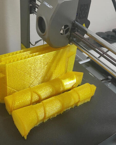 A close-up of a durable, large-scale FDM 3D printed prop or functional part, showing clean filament layers and structural integrity—ideal for props, architectural frames, and engineering prototypes.